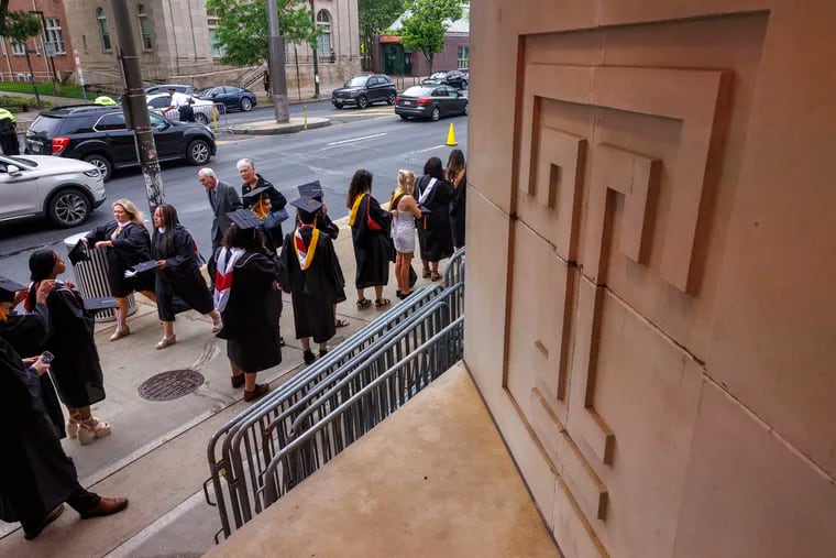 Graduates lined up outside the Liacouras Center for Temple University's 137th Commencement on May 8. Former President Donald Trump will be the first Republican presidential candidate to hold a campaign event on Temple's campus.