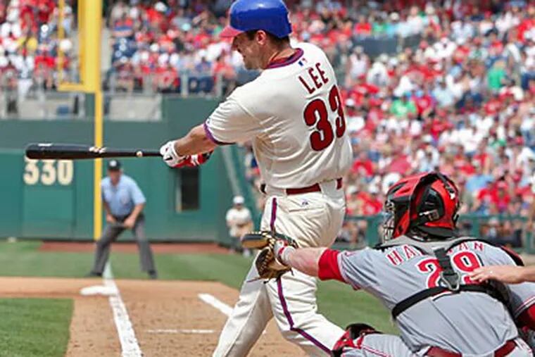 Cliff Lee knocked in three runs off of two hits against the Reds on Thursday. (David M Warren/Staff Photographer)