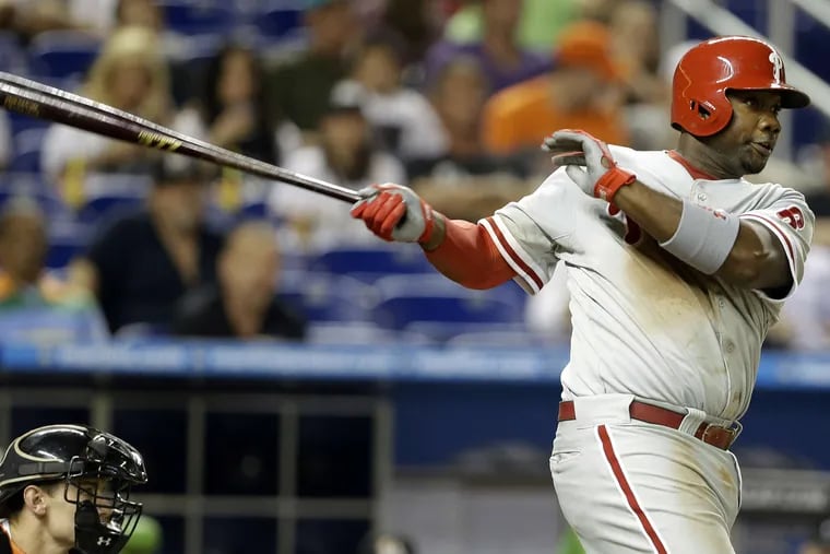Ryan Howard hits a single in the sixth inning during a the Phillies' win over the Marlins.