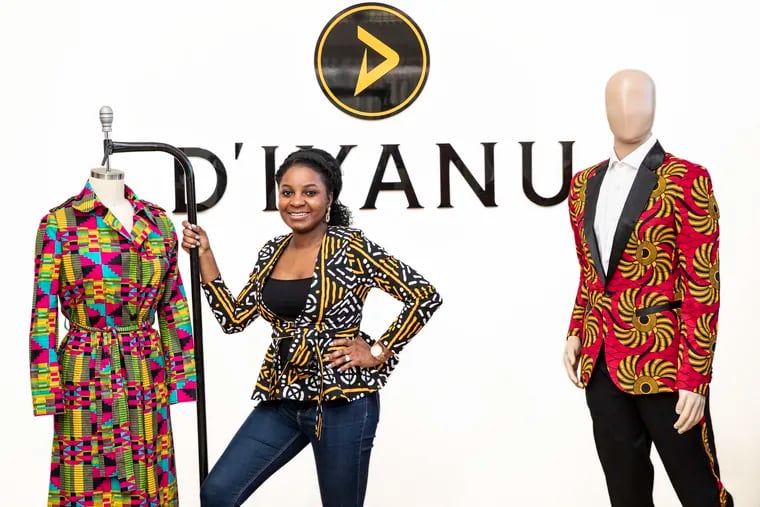 Addie Elabor, with an African print dress for women and a Kasim African print blazer, right, for men.
