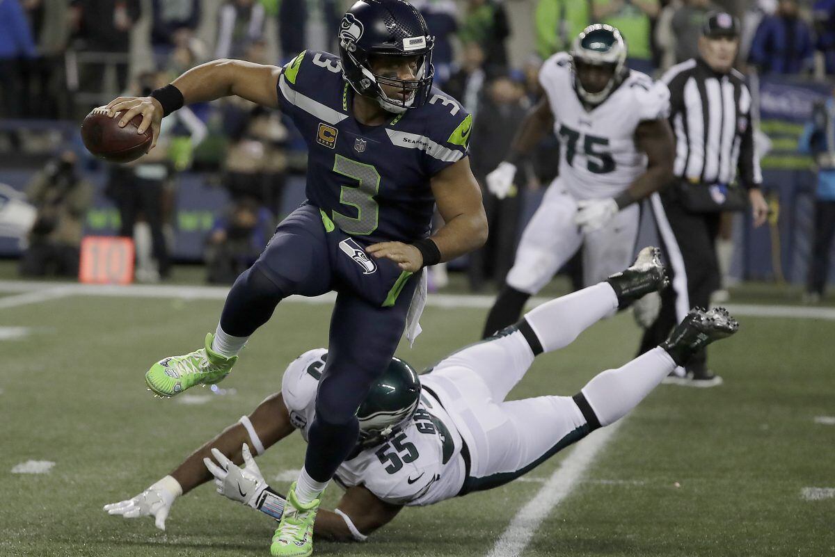 Jackson's legs, Ravens defense roll past Seahawks 30-16 - The Columbian