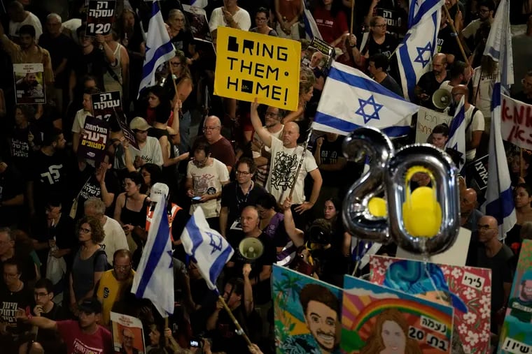 People protest against Israeli Prime Minister Benjamin Netanyahu's government and call for the release of hostages held in the Gaza Strip by the Hamas militant group, in Tel Aviv, Israel, on Saturday, June 22, 2024.
