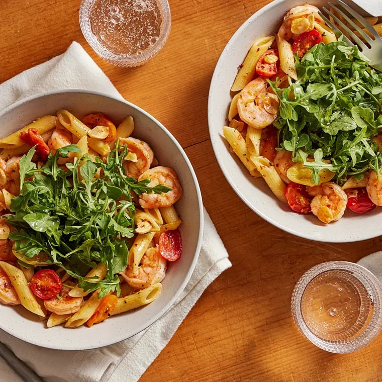 Penne With Shrimp, Toasted Garlic, and Arugula. MUST CREDIT: Tom McCorkle for The Washington Post; food styling by Gina Nistico for The Washington Post