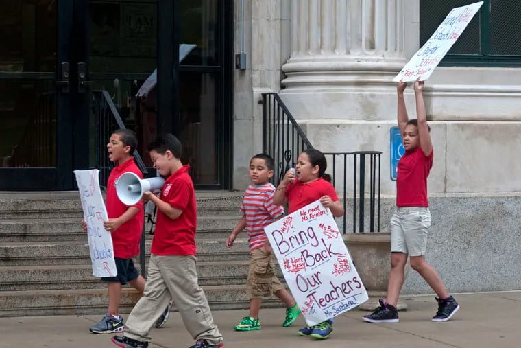 In October 2014, young Camden students from Sharp School protest budget cuts that forced teachers to be laid off; the school has since been closed.