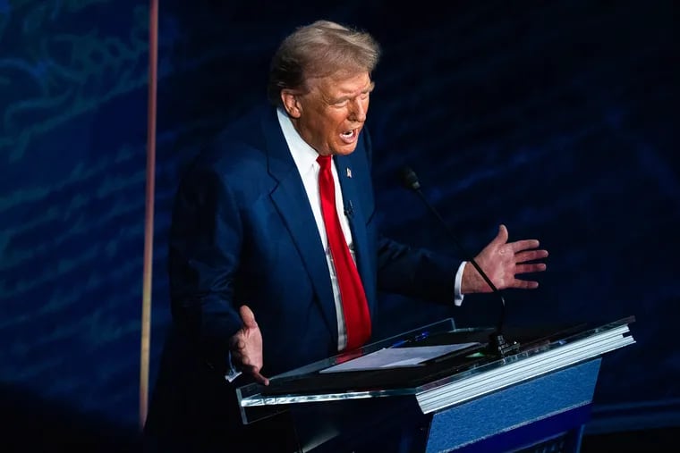 Former president Donald Trump speaks during Tuesday night's presidential debate in Philadelphia. MUST CREDIT: Demetrius Freeman/The Washington Post)