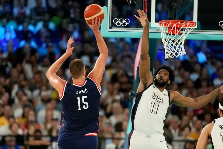 Joel Embiid (right) scored 19 points to help Team USA comeback in their semifinal game against Serbia.