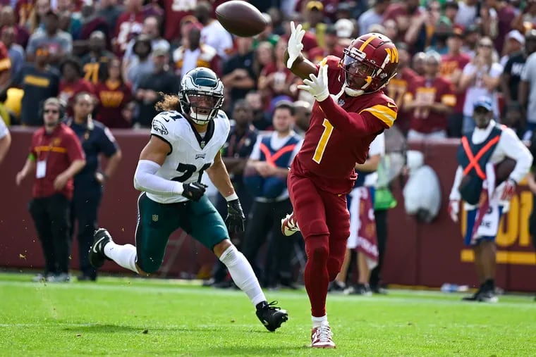 Wide receiver Jahan Dotson hauls in a 21-yard touchdown pass during a game against the Eagles, his new team.