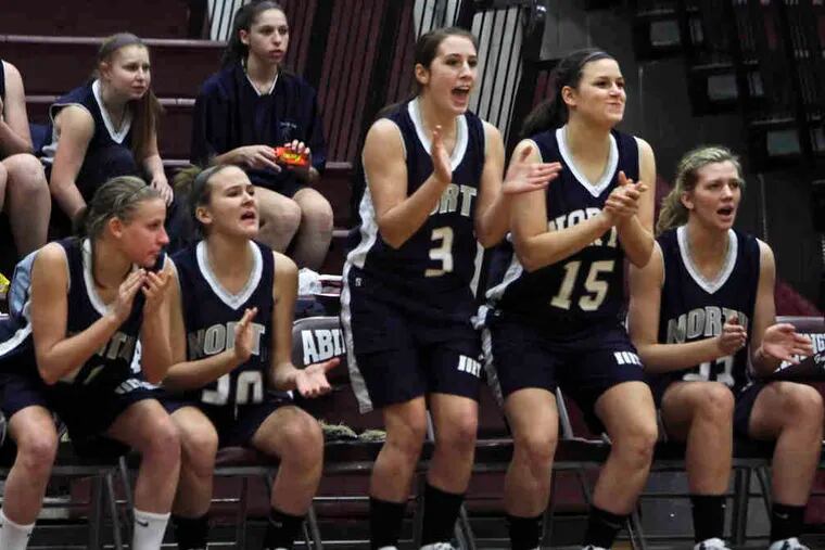 Players on the Council Rock North bench cheer their teammates during the 60-37 win. Lauren Gold led the Indians with 22 points.