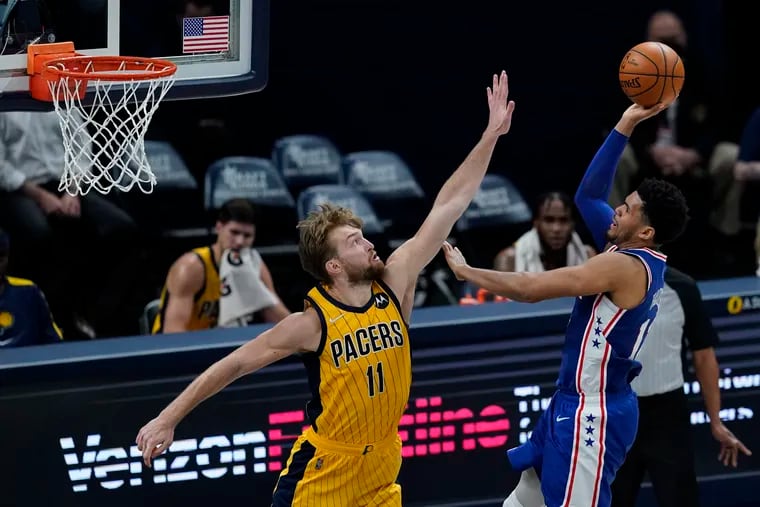 Tobias Harris shoots over Indiana's Domantas Sabonis during the Sixers' loss Tuesday night in Indianapolis.