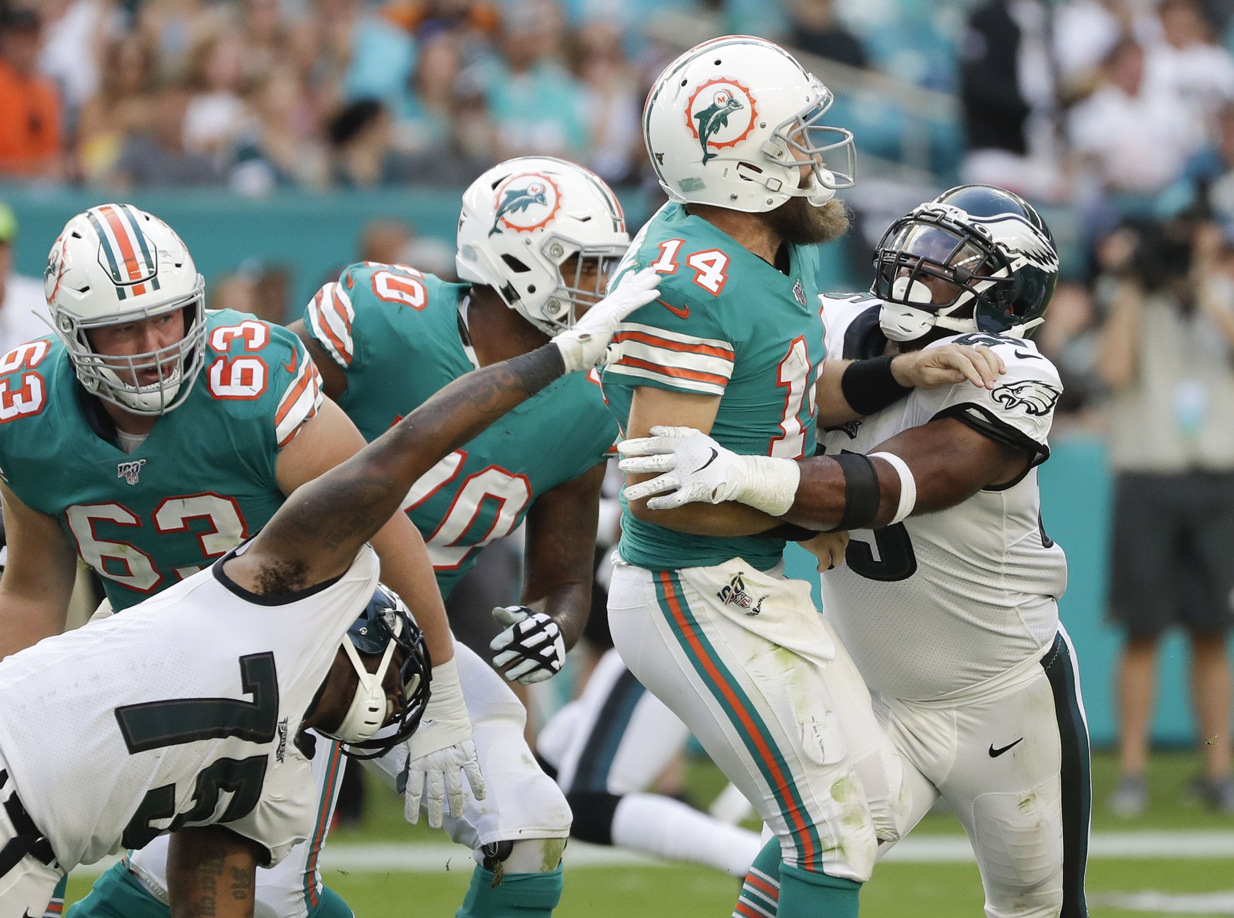 Miami Dolphins offensive guard Michael Deiter (63) waits for a