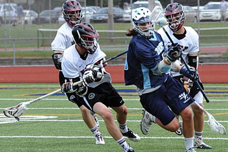 St. Joseph's Prep defenders pressure a Manheim Township player during their victory. ( April Saul / Inquirer )