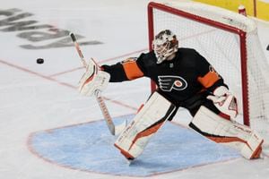 Carter Hart Philadelphia Flyers Autographed 16 x 20 Retro Photograph