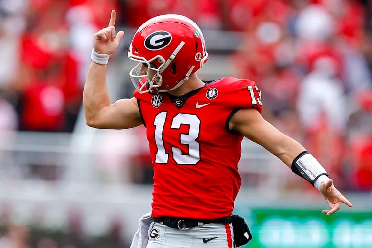 Georgia Bulldogs quarterback Stetson Bennett reacts after making a play against Tennessee in a home game on Nov. 4. Bennett and the Bulldogs are currently favored to repeat as national champions. (Photo by Todd Kirkland/Getty Images)