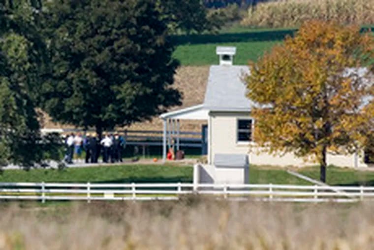 Days after the massacre last Oct. 2, a group visited the school where the gunman killed five students, and then himself.