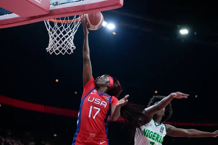 The United States' Kahleah Copper, a Philly native, drives past Nigeria's Sarah Ogoke during Olympic qualifying.