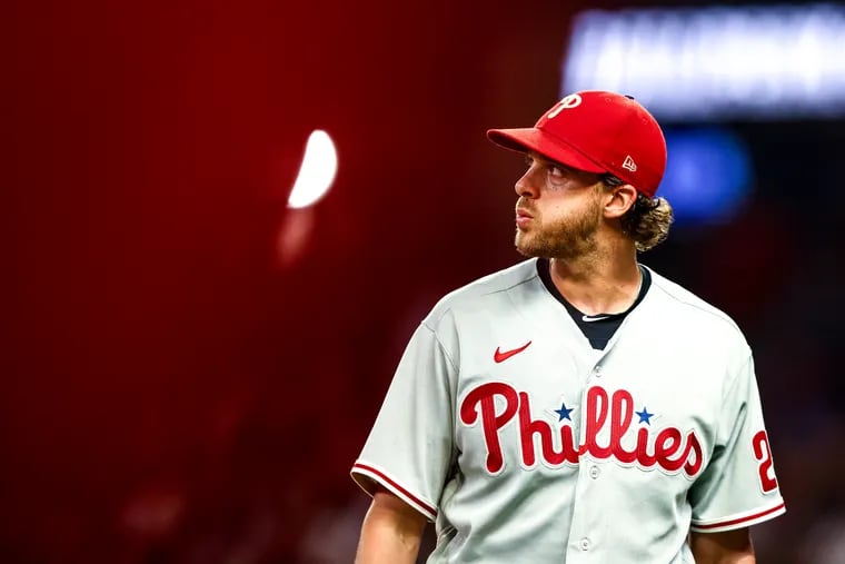 Aaron Nola of the Philadelphia Phillies walks off the mound after the third inning in which he gave up a two-run home run to right fielder Ronald Acuna Jr. of the Atlanta Braves at Truist Park on September 17, 2022 in Atlanta, Georgia. (Photo by Casey Sykes/Getty Images)