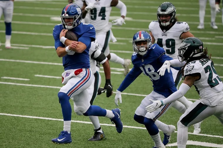 Giants QB Daniel Jones scores a touchdown on a 34-yard run in the first quarter against the Eagles, who fell 27-17 in Week 10.