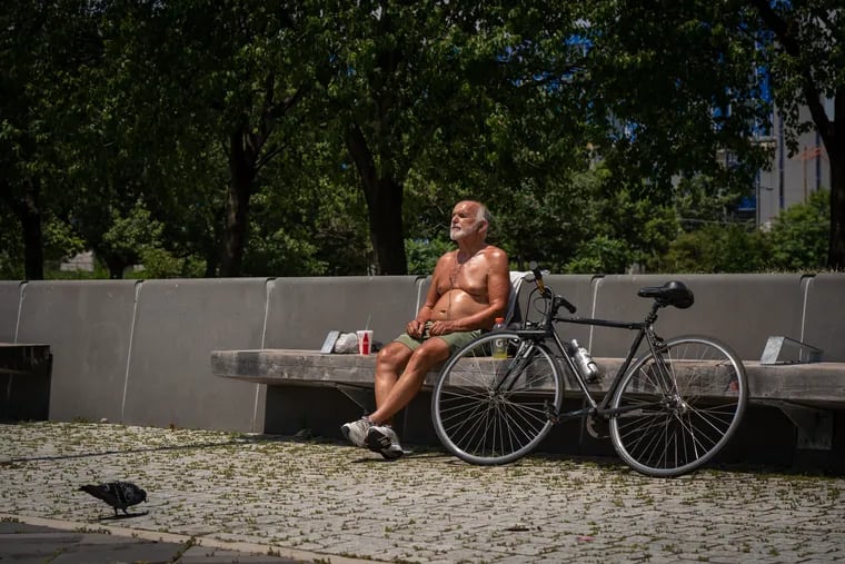 Wilhelm Tanczak, 75, retired, stopped at Penn Treaty Park after cycling July 8 during a heat wave.