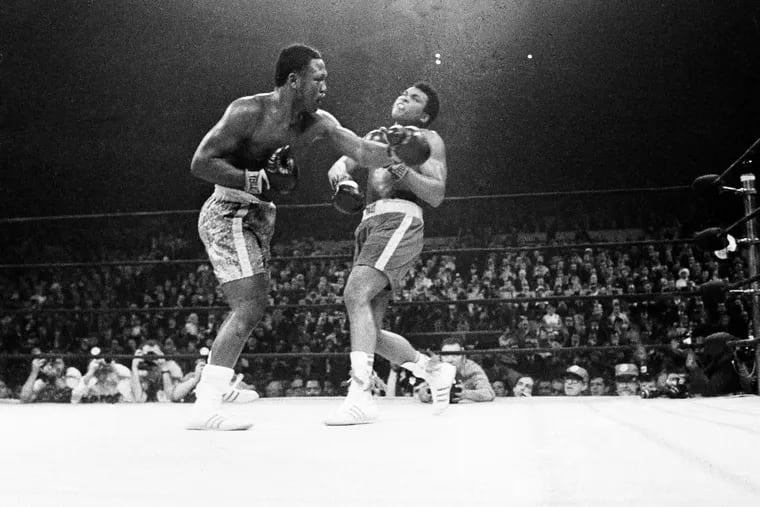 Joe Frazier connects with a left to the jaw of Muhammad Ali during the 15th round of their title bout in New York, March 8, 1971. Ali went down after the blow. Frazier kept his title on a unanimous decision.