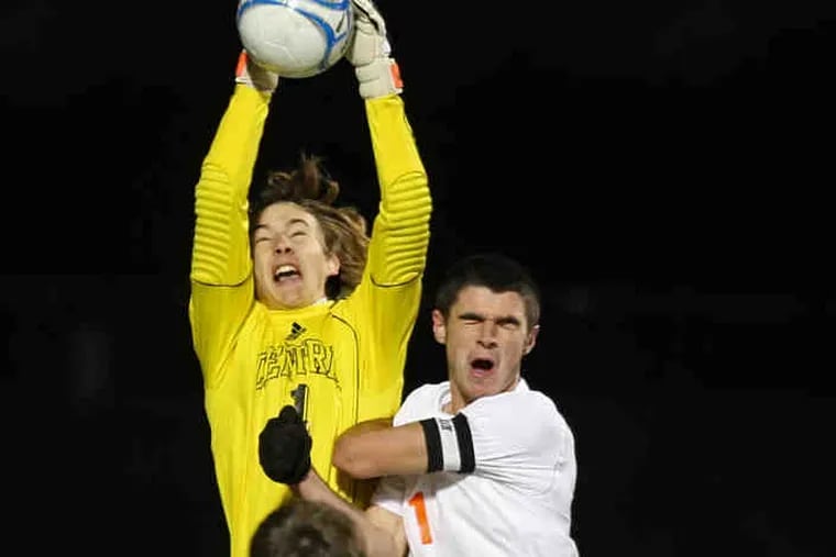 Hunterdon Central goalie Jake Schenck tries to keep the ball away from Cherokee's Dave Schlatter during the Chiefs' state championship win. Schlatter scored the game's only goal.