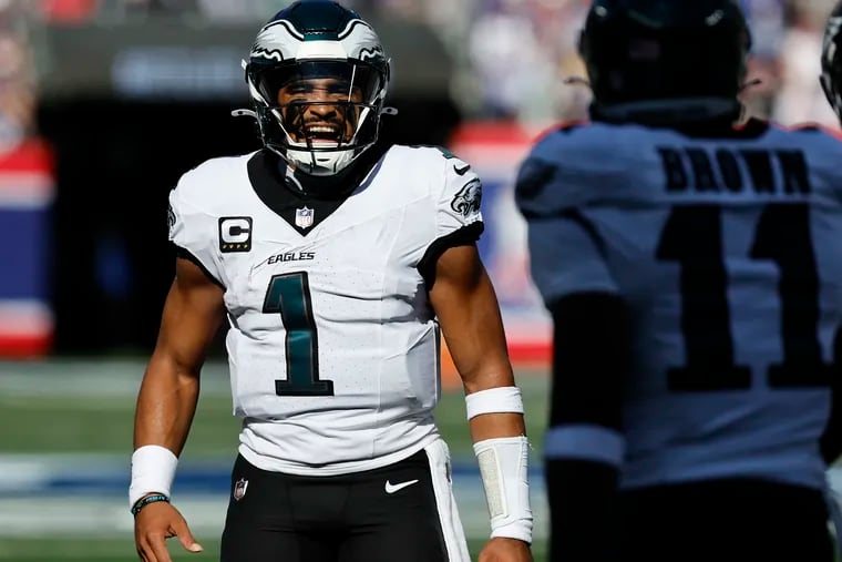 Eagles quarterback Jalen Hurts yells after throwing second quarter touchdown pass to teammate wide receiver A.J. Brown against the against the New York Giants at MetLife Stadium in East Rutherford, New Jersey on Sunday, October 20, 2024.