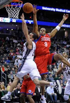 Jordan Farmar of the New Jersey Nets shoots the ball against the