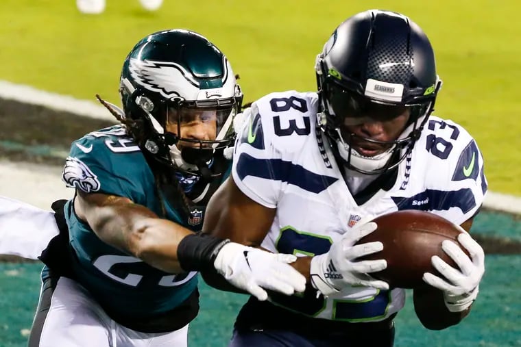 Seattle Seahawks wide receiver David Moore catching a touchdown pass while defended by Eagles cornerback Avonte Maddox last season.