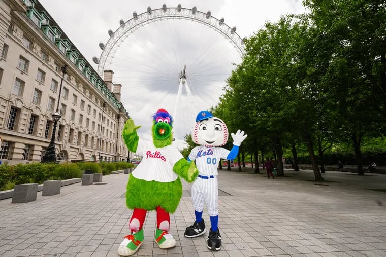 Mets mascot Mr. Met and the Phanatic pose for a photo during at the London Eye on Thursday in London.