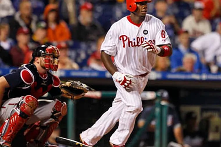 Howard leads Phils past Braves