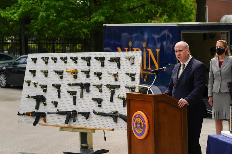 Mike Garvey, Director of the Philadelphia Police Department Office of Forensic Science, speaks at the podium during a press conference in 2021 to announce new support services to bolster the department's forensic capabilities.