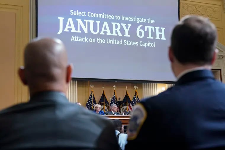 U.S. Capitol Police Sgt. Aquilino Gonell (left) and Washington Metropolitan Police Department Officer Daniel Hodges listen during a hearing last week by the House select committee investigating the Jan. 6, 2021, insurrection.