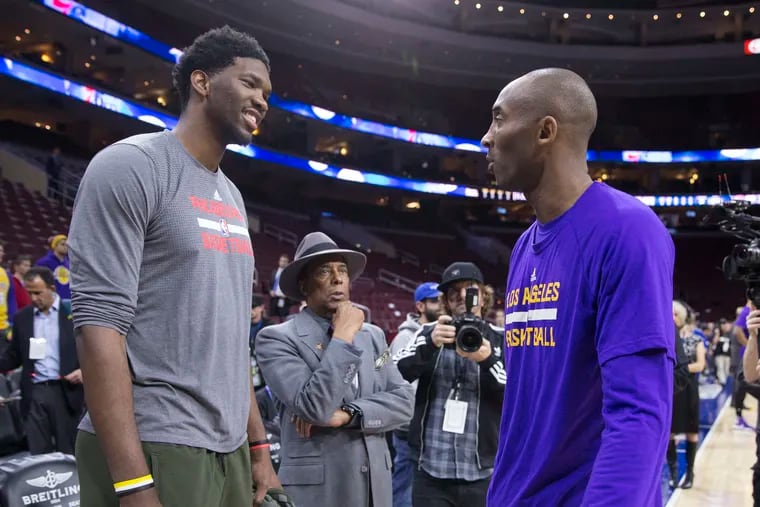 Joel Embiid (left) talked to Kobe Bryant before a December 2015 game at the Wells Fargo Center. It was Bryant's last game against the Sixers.