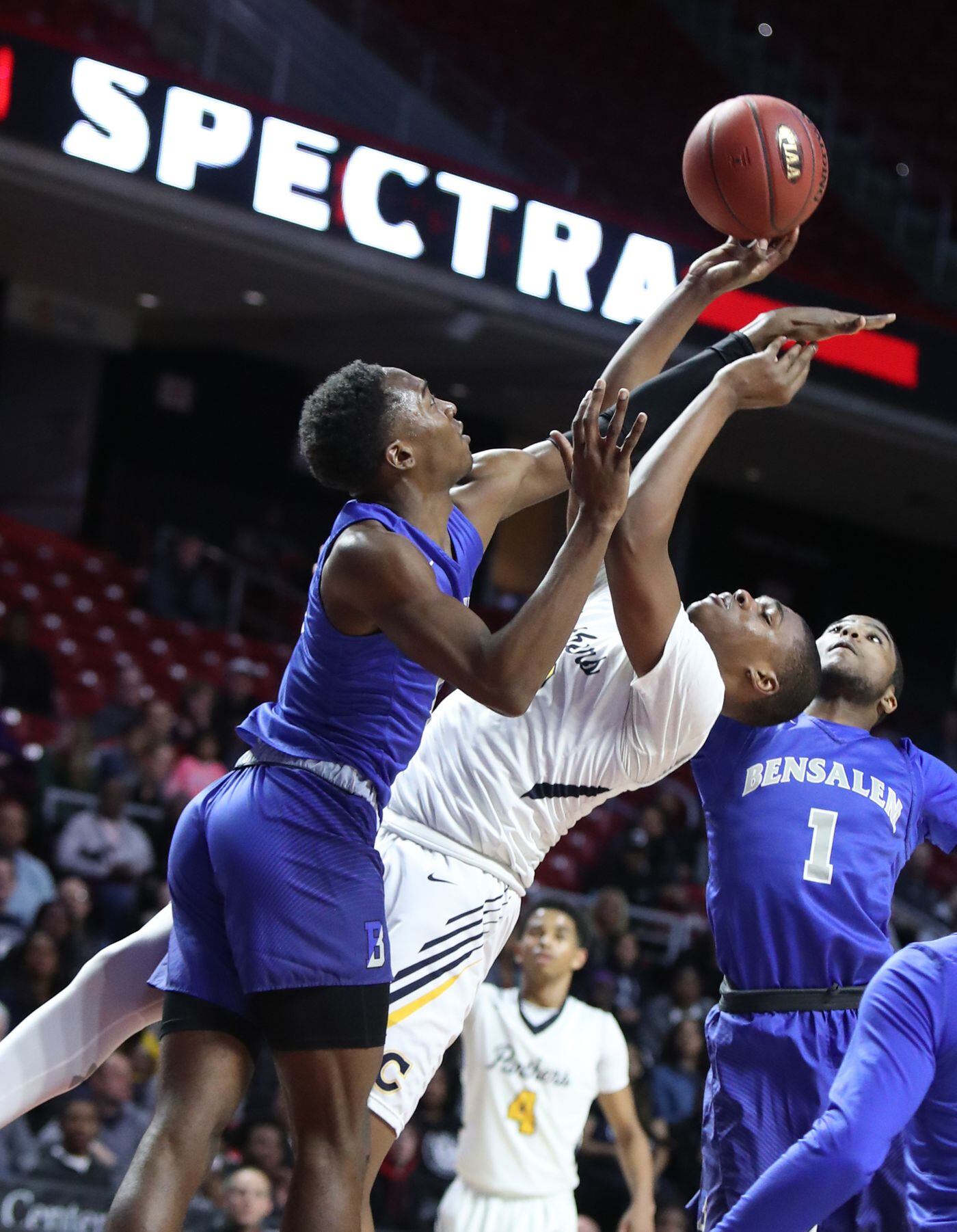 Jaelen McGlone (center) of Cheltenham gets fouled by Jeremiah Alexander of Bensalem in the District 1, Class 6A semifinals at the Liacouras Center.