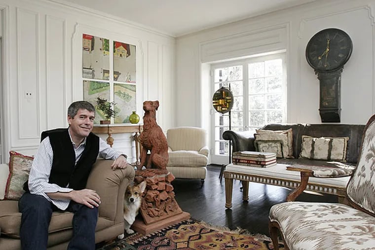 Keith Johnson, found-objects buyer for Anthropologie stores, decorates his own home with objects he has discovered, including a stone dog from Ireland and an English tavern clock. Once used as French textile presses, these panels are sold for a new purpose: Wall art.