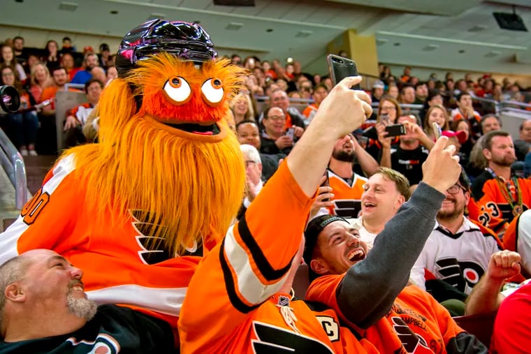 Who is Gritty? We asked Flyers fans to try to describe their “hideous  monster.”  Who is Gritty? We asked Flyers fans to try to describe their  “hideous monster.” Escape into more