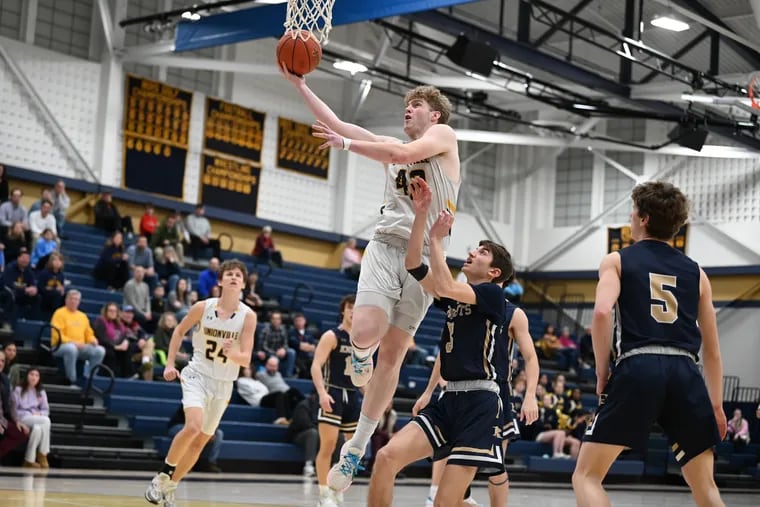 Unionville senior Nick Diehl goes up for a shot against West Chester Rustin on Jan. 23.