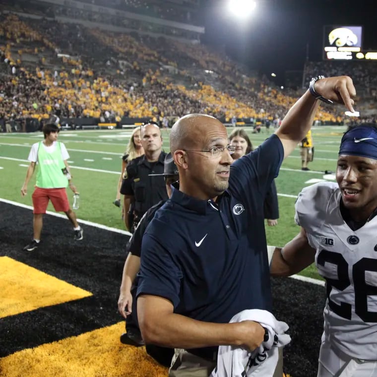 Saquon Barkley (right) played for Penn State and head coach James Franklin for three seasons.