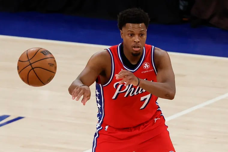 Sixers guard Kyle Lowry passes the basketball against New York Knicks during Game 1 of the Eastern Conference playoffs at Madison Square Garden in New York on Saturday, April 20, 2024.