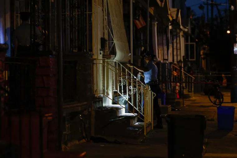 Police investigate a shooting at the 3200 block of D Street in Philadelphia on Wednesday.