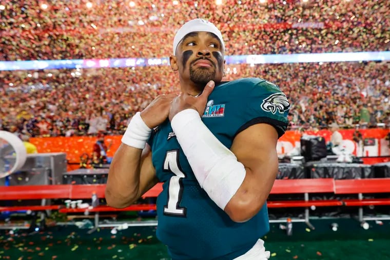 Eagles quarterback Jalen Hurts walks off the field after losing to the Kansas City Chiefs in Super Bowl LVII at State Farm Stadium on Sunday, February 12, 2023 in Glendale, AZ.