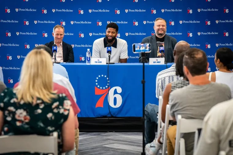 After 14 years spanning three teams, 34-year old Paul George (center) joined the Sixers in free agency earlier this month.