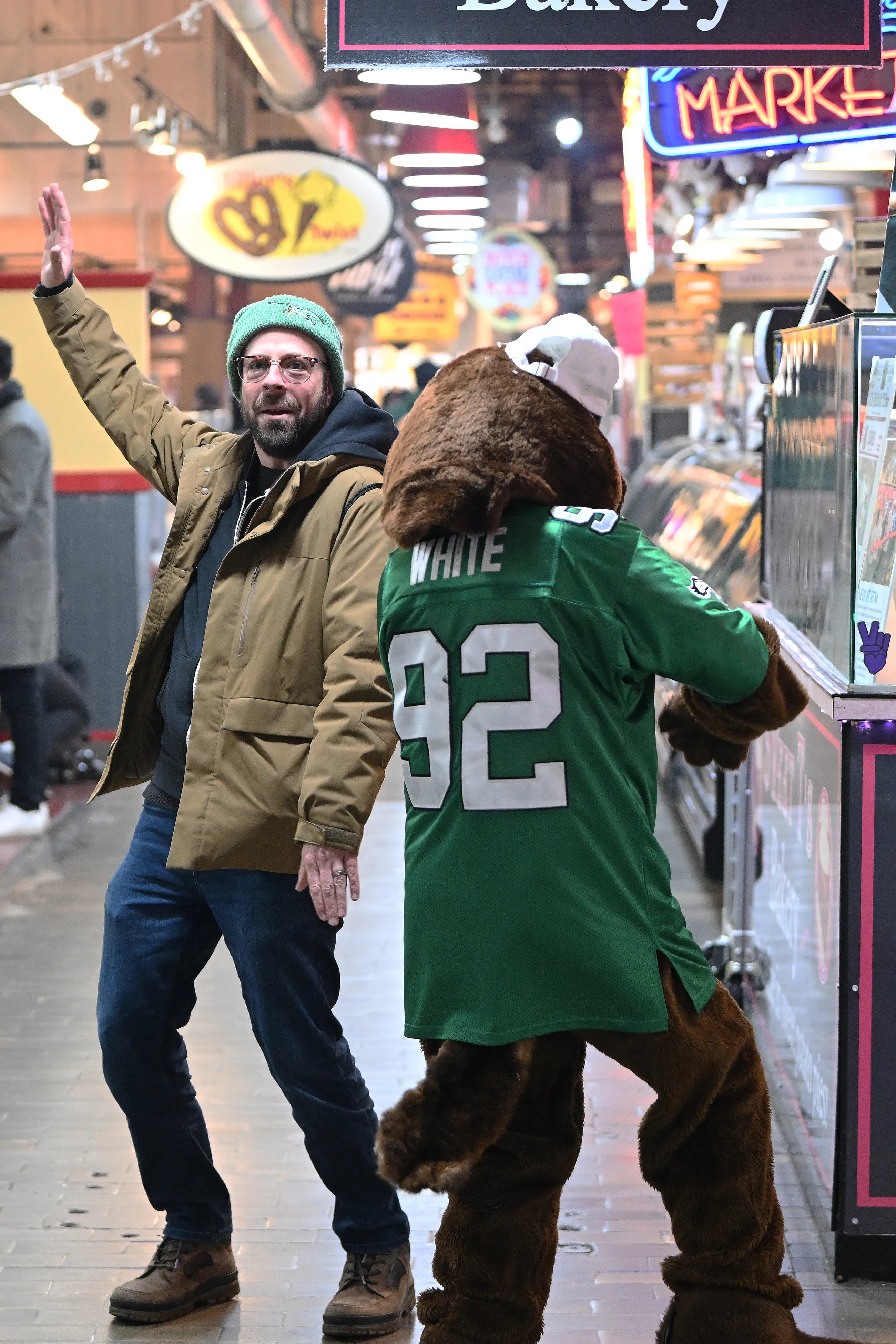 Punxsutawney Phil wore Reggie White jersey and danced with Eagles fans at  Reading Terminal Market