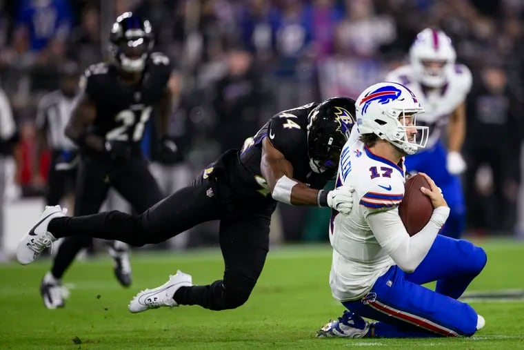 Buffalo Bills quarterback Josh Allen absorbing a hit during a Sept. 29 game against the Baltimore Ravens.