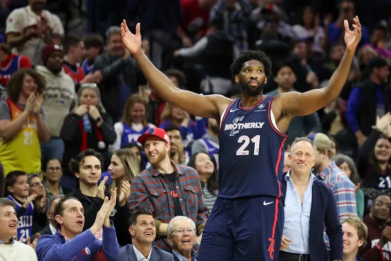 Sixers center Joel Embiid gestures after he exits the game following a 51-point performance against the Minnesota Timberwolves at the Wells Fargo Center on Wednesday.
