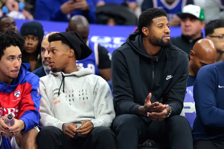 Paul George (right) hyperextended his left knee during last week's preseason game vs. the Atlanta Hawks.