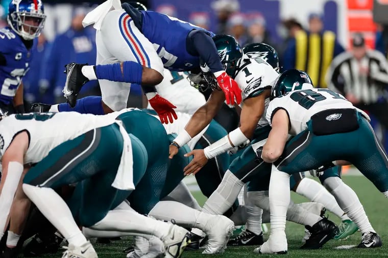 New York Giants linebacker Bobby Okereke jumps offsides during the Eagles' Tush Push during their Jan. 7 matchup last season.