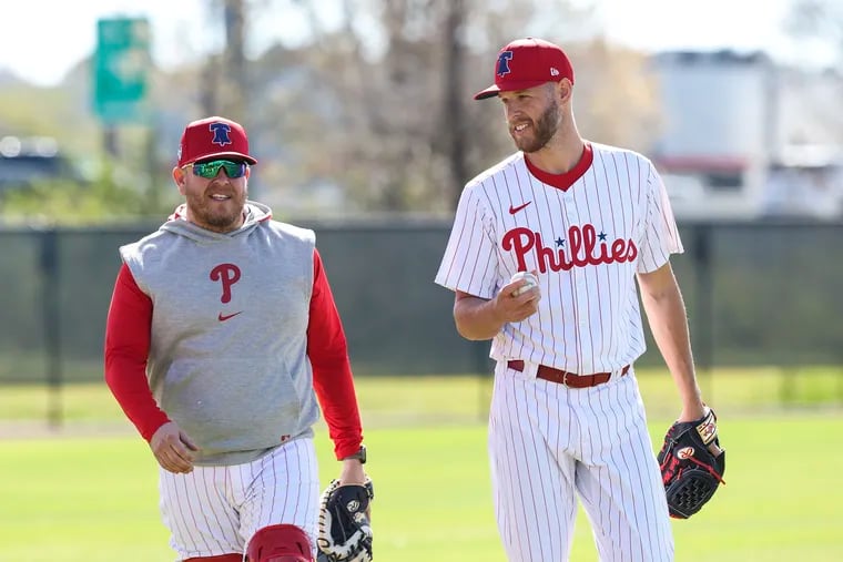 Phillies pitcher Zack Wheeler, right, says he wants "what I feel like I’ve earned” in a contract extension.