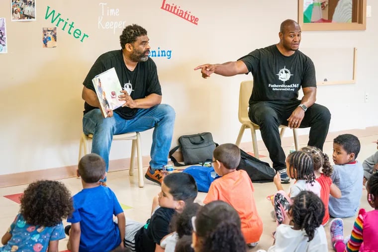 Brent Johnstone (left) and Akeiff Staples (right), cofounders of Fathers Read 365, at Acelero Learning Center in Philadelphia, Thursday, July 27, 2023. Black families and teachers should recreate the "porch lessons" of yesteryear to improve literacy among Black and marginalized children, write Sharif El-Mekki and Heseung Song.