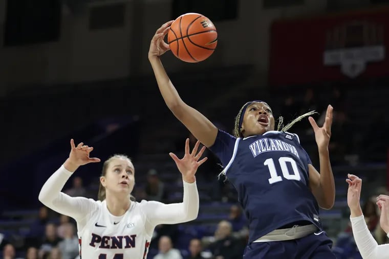 Christina Dalce (10) pulls in a rebound in front of Penn's Floor Toonders during a game on Nov. 17. Dalce, a sophomore, is averaging 7.1 points and 8.1 rebounds this season.