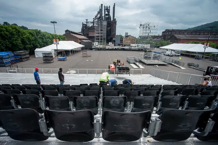 Crews prepare the stage during 2021's edition of Musikfest at the PNC Plaza at SteelStacks in South Bethlehem.